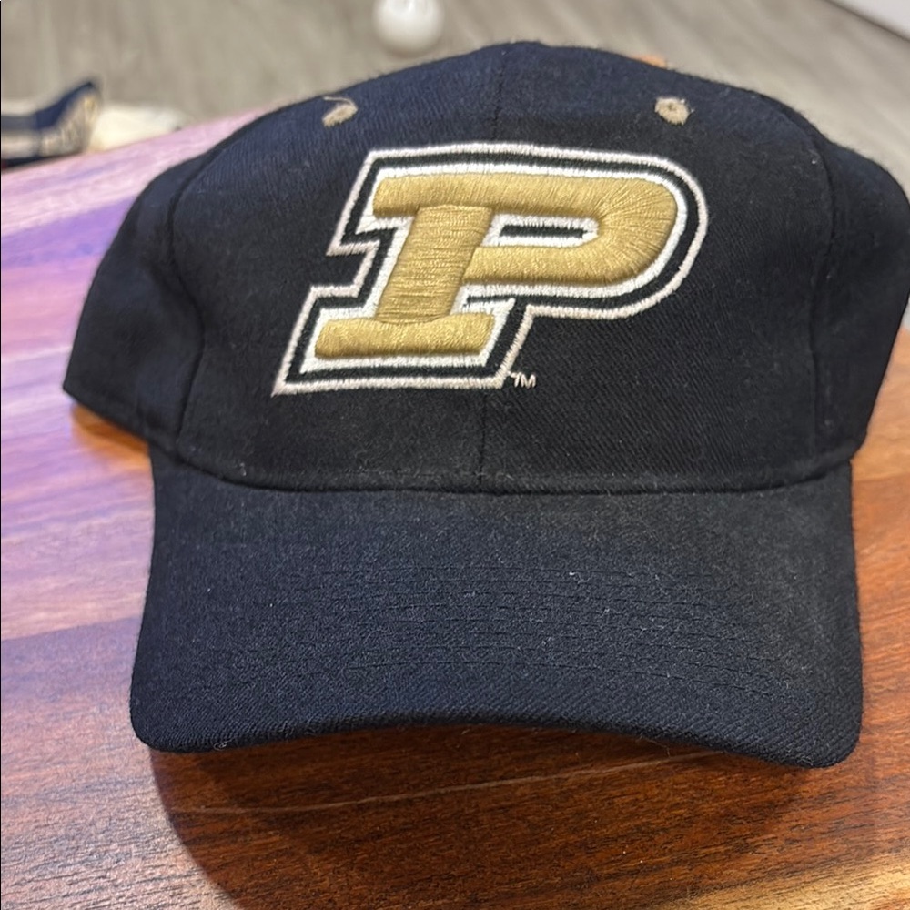 Black Cap with Gold 'P' Logo
